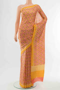Pink Printed Silk Saree with Floral Print on the body and Fancy Border displayed on a mannequin