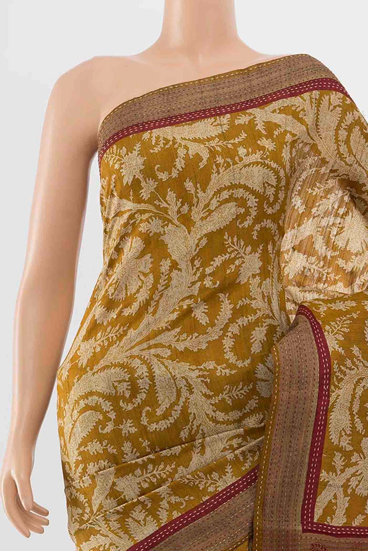 Border image of Mustard Tussar Silk Saree with Printed design on the body and Embroidery Border