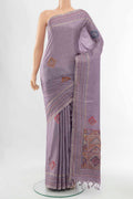 Lavender Blended Tussar Silk Saree with Embroidery on the body and Embroidery Border displayed on a mannequin