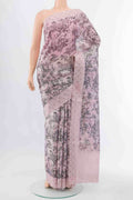 Off White Blended Art Silk Saree with Printed design on the body and Embroidery Border displayed on a mannequin