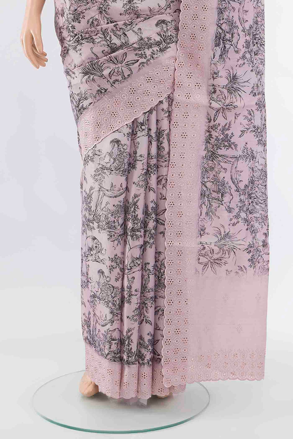 Pleats and pallu of Off White Blended Art Silk Saree with Printed design on the body and Embroidery Border