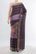 Lavender Art Silk Saree with Floral Print on the body and Silk Border.  displayed on a mannequin