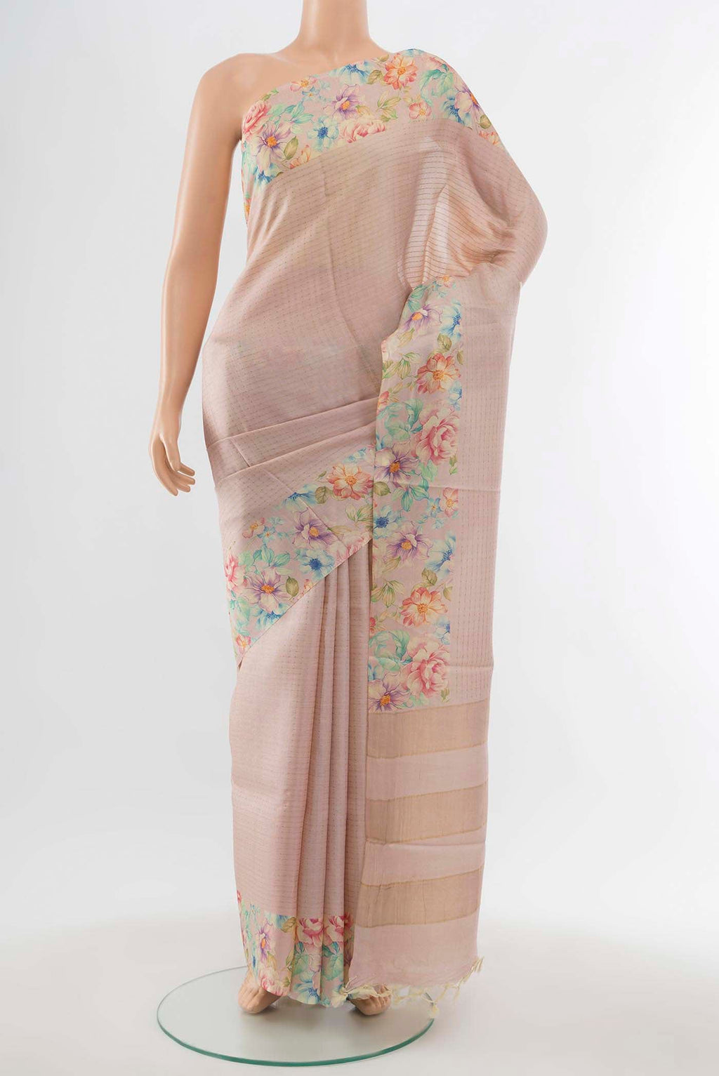 Rose pink Tussar Silk Saree with Floral Print on the body and Fancy Border displayed on a mannequin