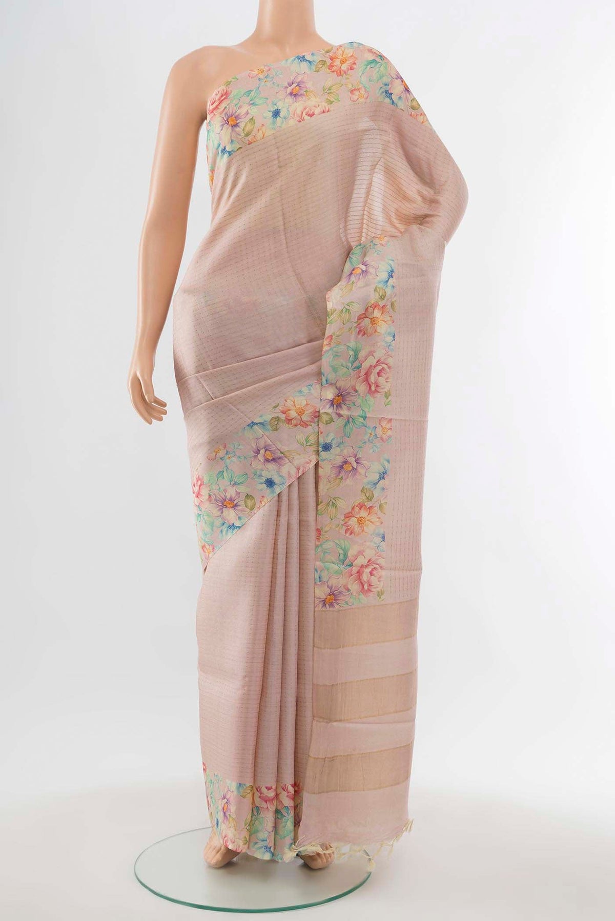 Rose pink Tussar Silk Saree with Floral Print on the body and Fancy Border displayed on a mannequin