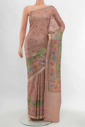 Dark Beige Tussar Silk Saree with Floral Print on the body and Silk Border displayed on a mannequin