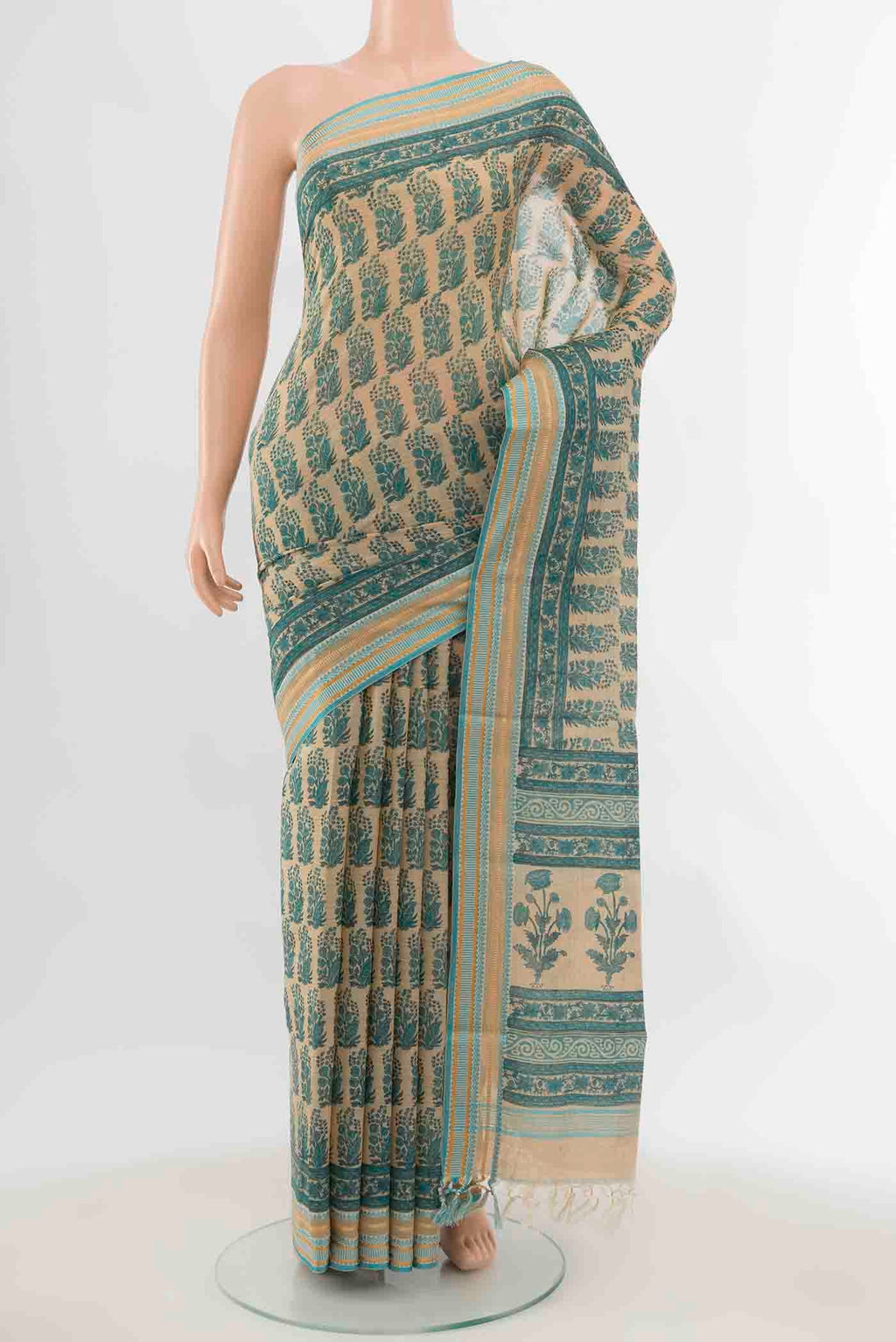 Beige Maheshwari Silk Cotton Saree with Zari Butta on the body and Fancy Border displayed on a mannequin