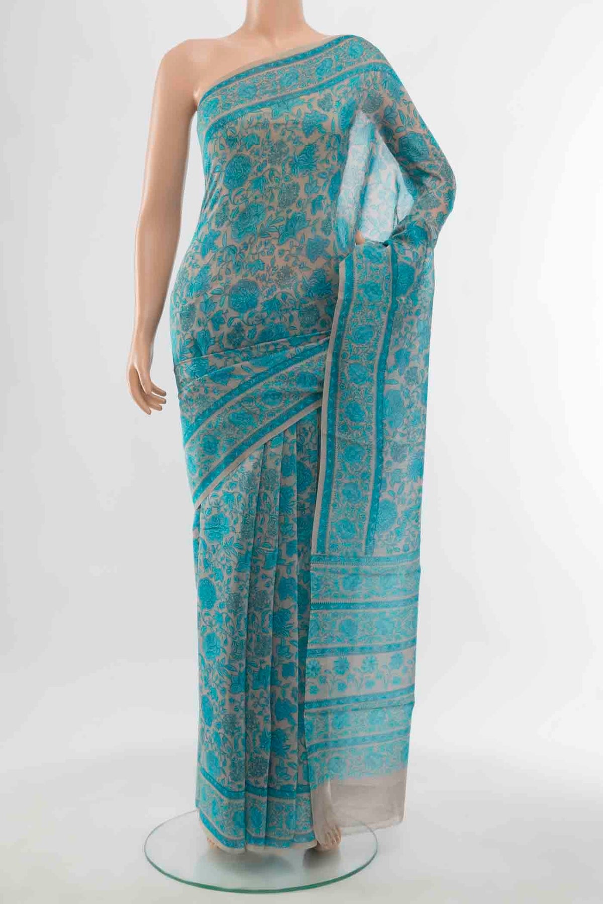 Light Blue Maheshwari Silk Cotton Saree with Floral Print on the body and Silk Border displayed on a mannequin