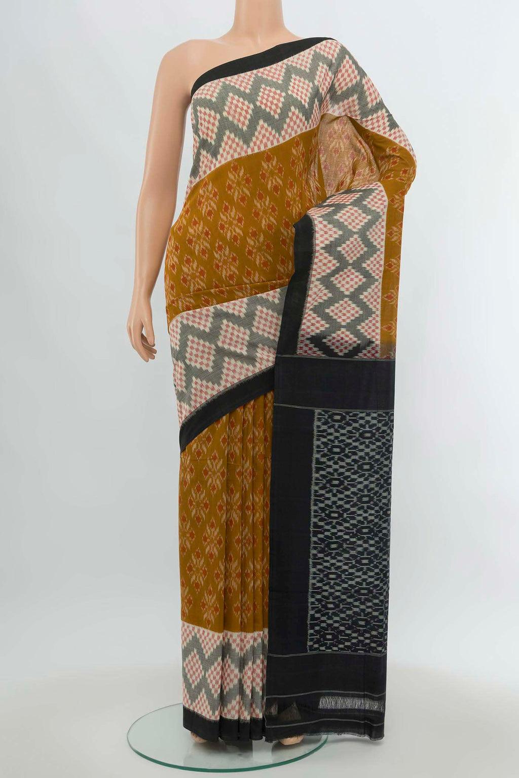 Multi Color Pochampally Cotton Saree with Checked design on the body and Fancy Border.  displayed on a mannequin
