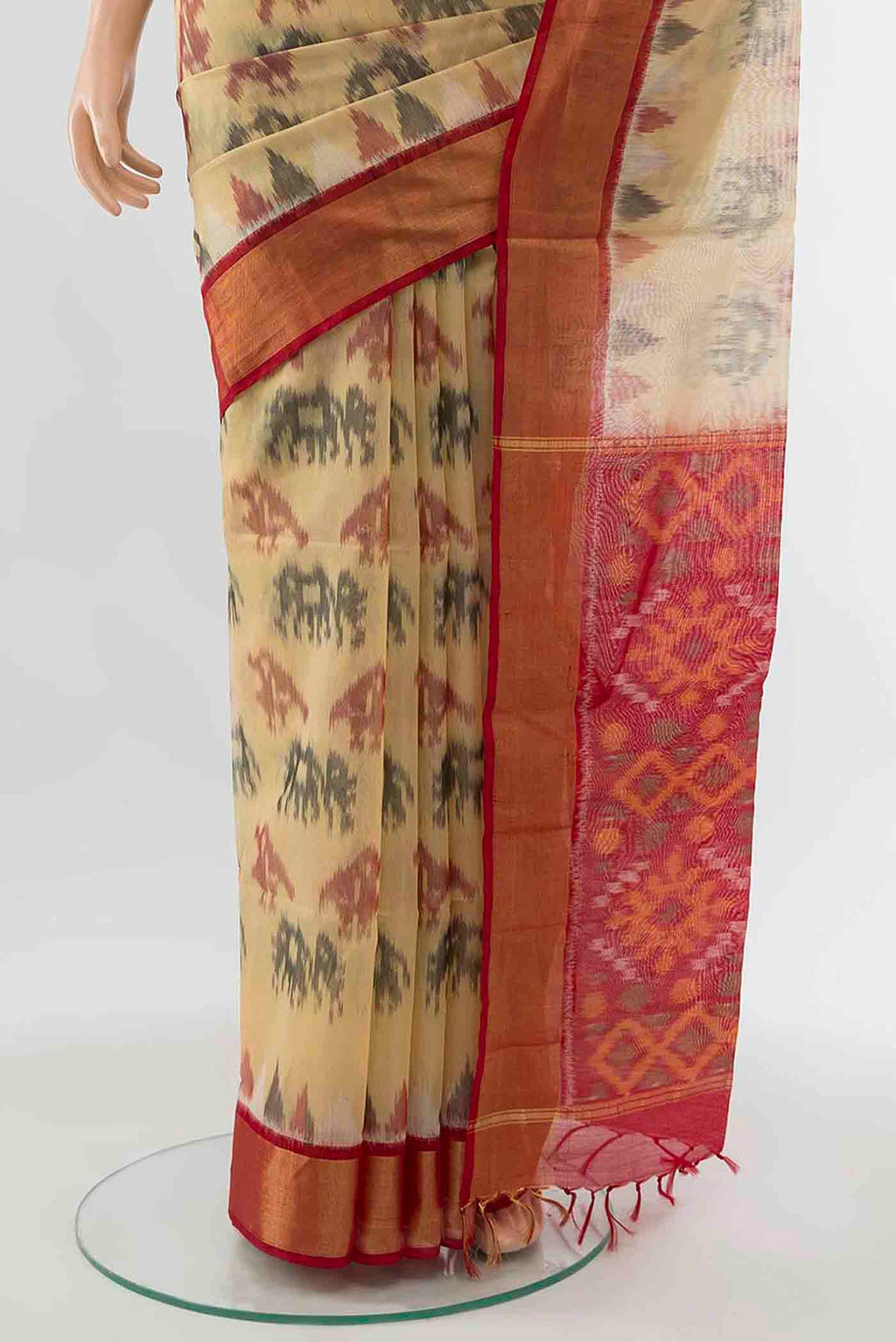 Pleats and pallu of Beige Kora Cotton Saree with Batik Print on the body and Silk Border