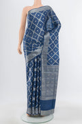 Pure Silk Pure Zari Light Blue Banarasi Raw Saree with Zari Butta on the body and Silk Border.  displayed on a mannequin