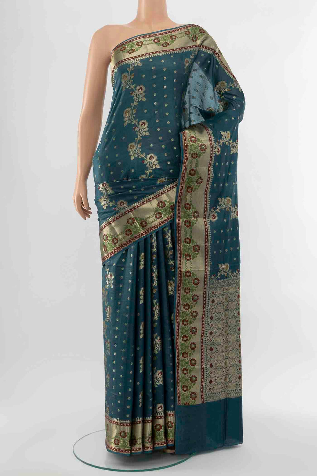 Light Blue Banarasi Raw Silk Saree with Zari Butta on the body and Silk Border displayed on a mannequin