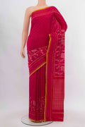 Rani Pink Pochampally Saree with Ikat Print on the body and Silk Border.  displayed on a mannequin