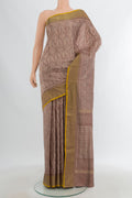 Mauve Pochampally Silk Saree with Pure Ikat on the body and Zari Border.  displayed on a mannequin