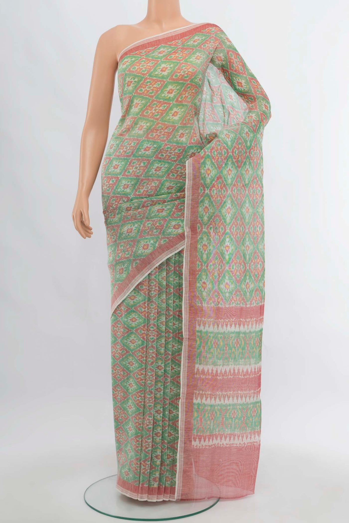 Multi Color Pochampally Saree with Ikat Print on the body and Silk Border.  displayed on a mannequin