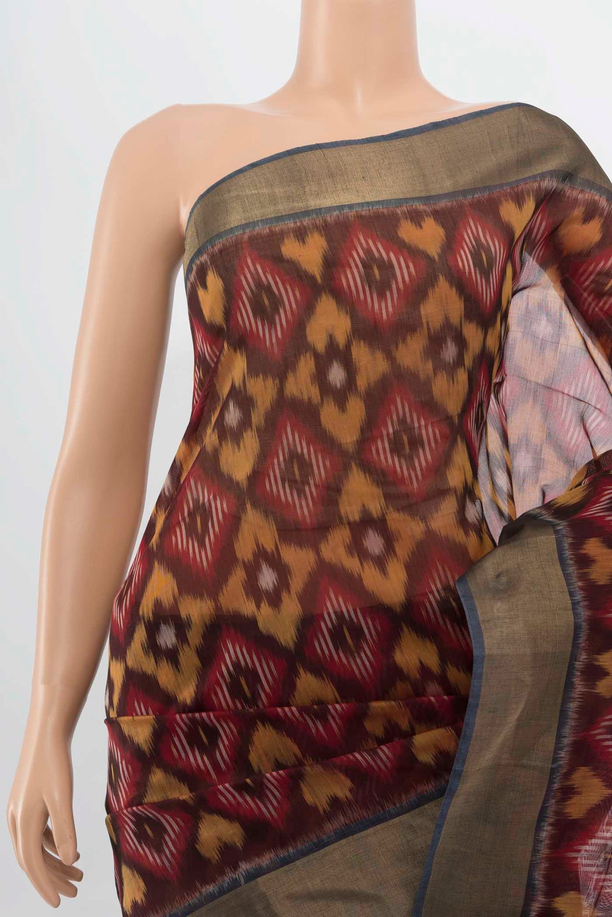 Border image of Maroon Maheshwari Silk Cotton Saree with Ikat Print on the body and Silk Border. 
