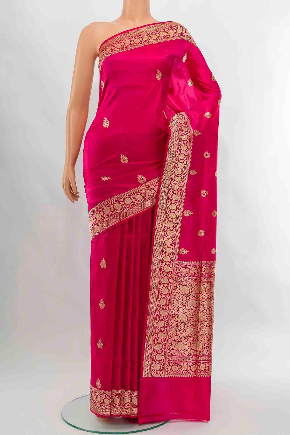 Dark Pink Banarasi Katan Silk Saree with Zari Butta on the body and Silk Border displayed on a mannequin