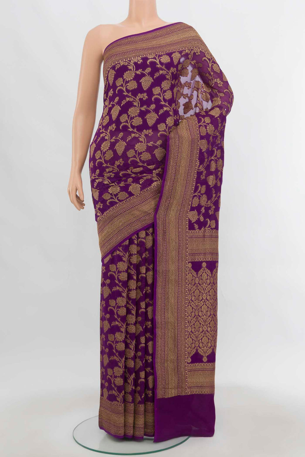 Purple Banarasi Georgette Saree with Zari Butta on the body and Zari Border.  displayed on a mannequin
