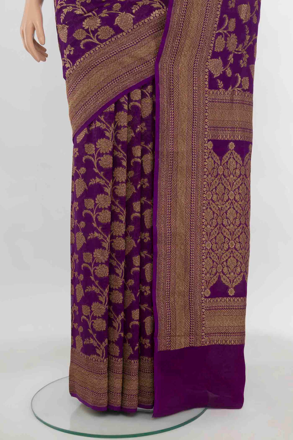 Pleats and pallu of Purple Banarasi Georgette Saree with Zari Butta on the body and Zari Border. 