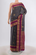 Davys Grey Dual Tone Kanjivaram Silk Saree with Zari Butta on the body and Zari Border.  displayed on a mannequin