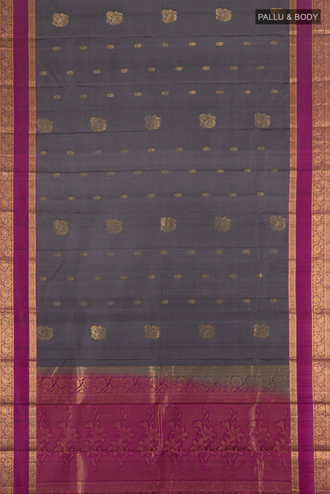 Flat view of Davys Grey Dual Tone Kanjivaram Silk Saree with Zari Butta on the body and Zari Border. 