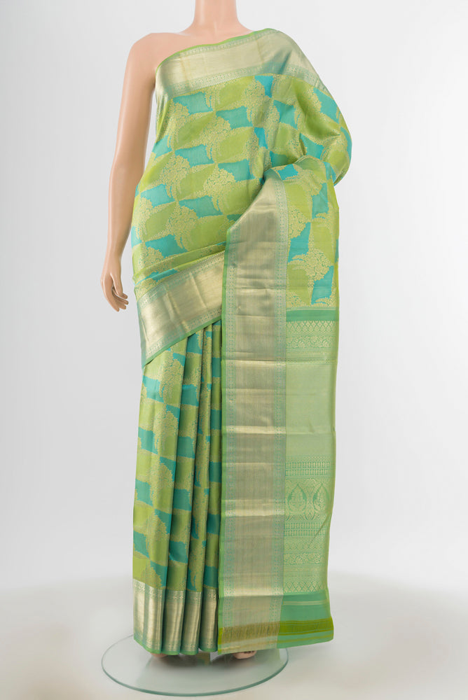 Multi Color Kanjivaram Silk Saree with Zari Brocade on the body and Zari Border.  displayed on a mannequin