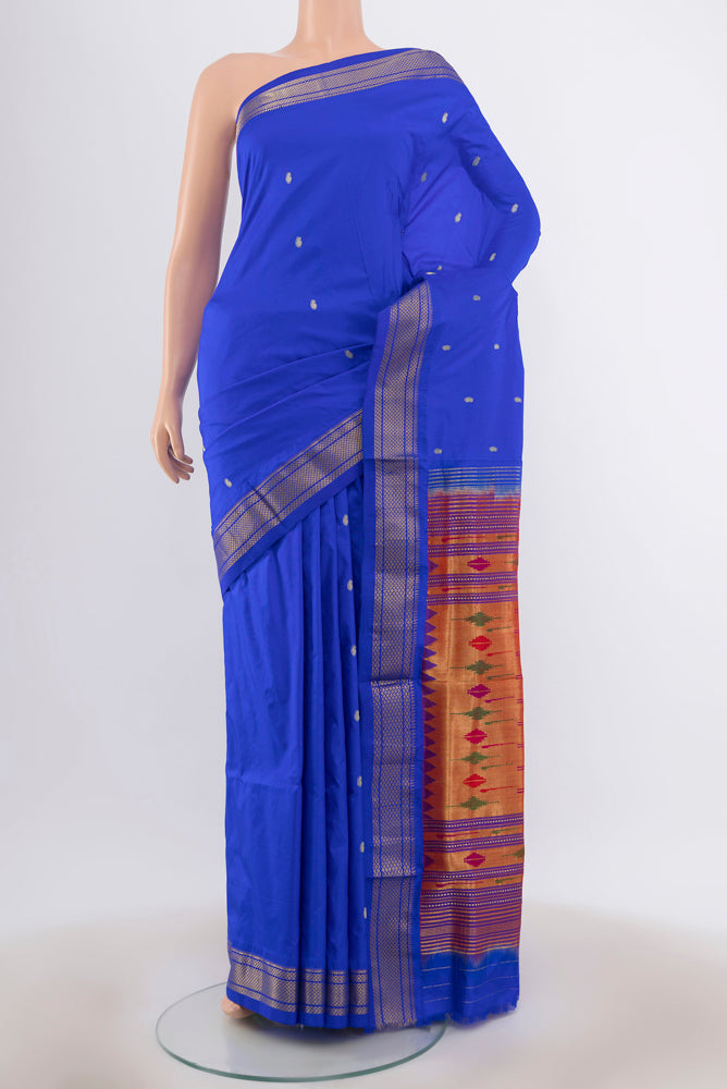 Royal Blue Paithani Silk Saree with Zari Butta on the body and Zari Border.  displayed on a mannequin