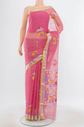 Pure Silk Pure Zari Peach Kota Saree with Zari Butta on the body and Silk Border.  displayed on a mannequin