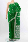 Bottle Green Assam Silk Saree with Thread Butta on the body and Silk Border displayed on a mannequin
