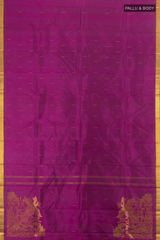 Flat view of Purple Kanjivaram Silk Saree with Zari Butta on the body and Zari Border. 