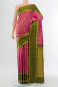 Pure Silk Pure Zari Purple Kanchipuram Saree with Zari Butta on the body and Silk Border.  displayed on a mannequin