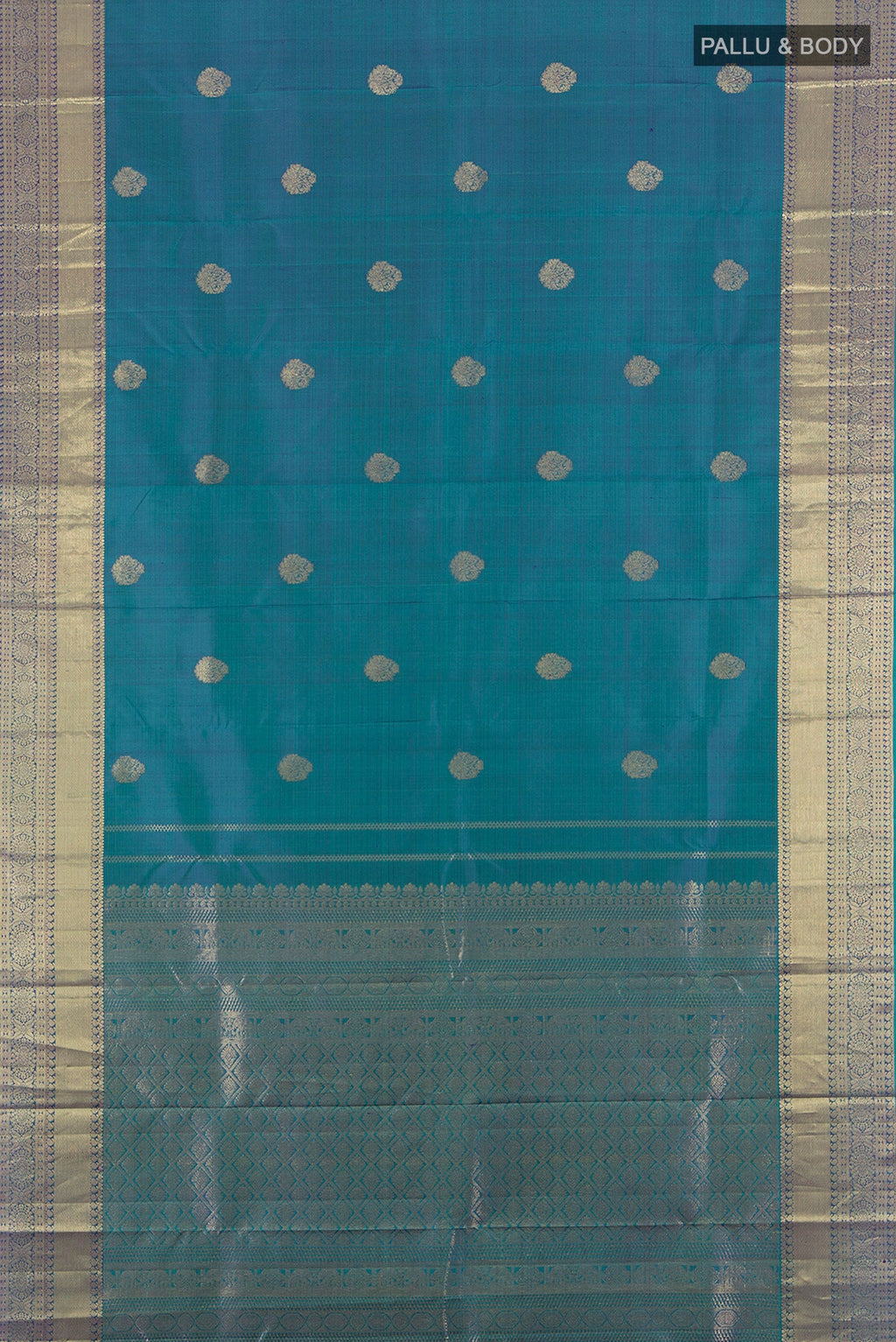 Flat view of Pure Silk Pure Zari Peacock Blue Kanchipuram Saree with Zari Butta on the body and Silk Border. 