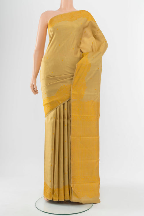 Beige Kanchipuram Silk Saree with Jacquard With Thread Butta on the body and Silk Border.  displayed on a mannequin