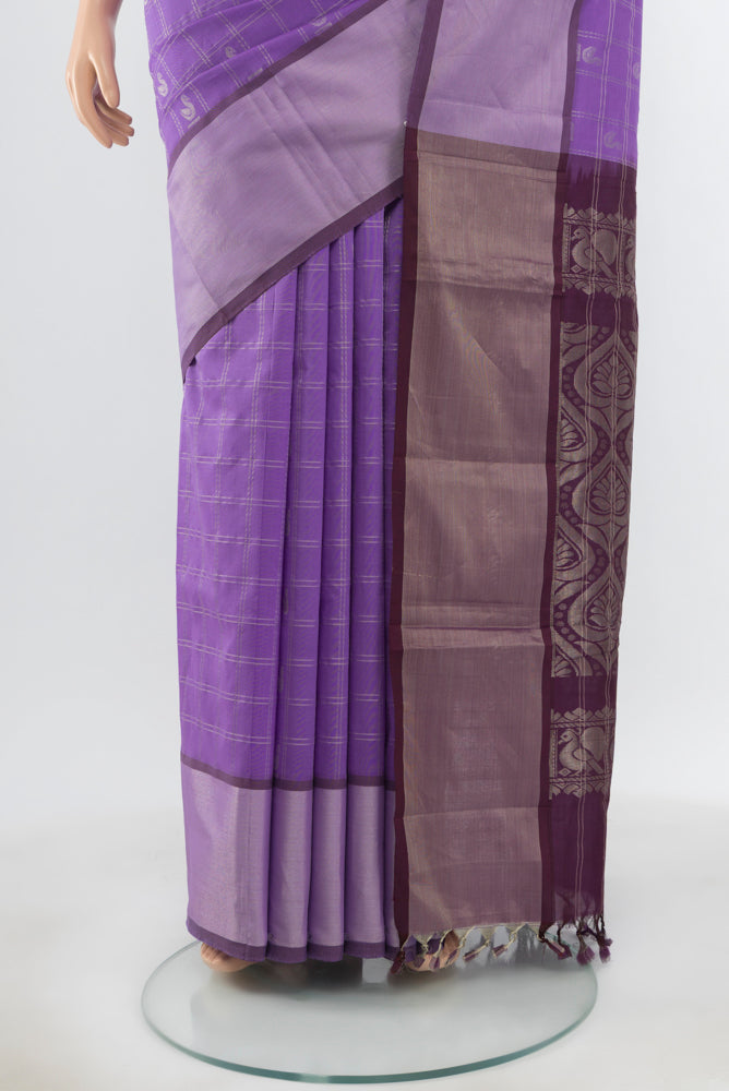 Pleats and pallu of Pure Silk Pure Zari Lavender Silk Cotton Saree with Zari Butta on the body and Silk Border. 