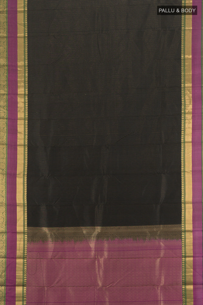Flat view of Black Kanjivaram Silk Saree with Zari Butta on the body and Zari Border. 