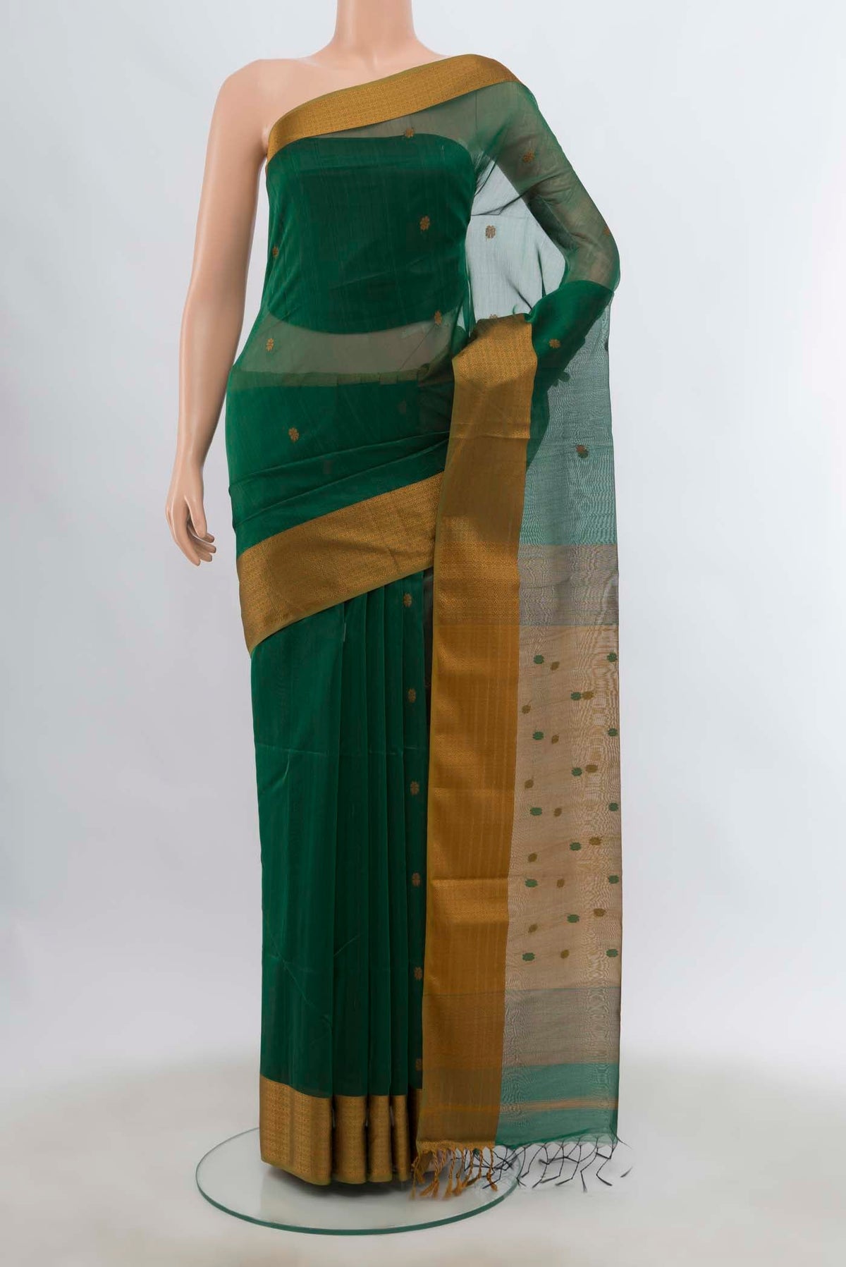 Green Maheshwari Silk Cotton Saree with Thread Butta on the body and Thread Border displayed on a mannequin