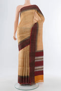 Beige Tussar Silk Saree with Printed design on the body and Zari Border.  displayed on a mannequin