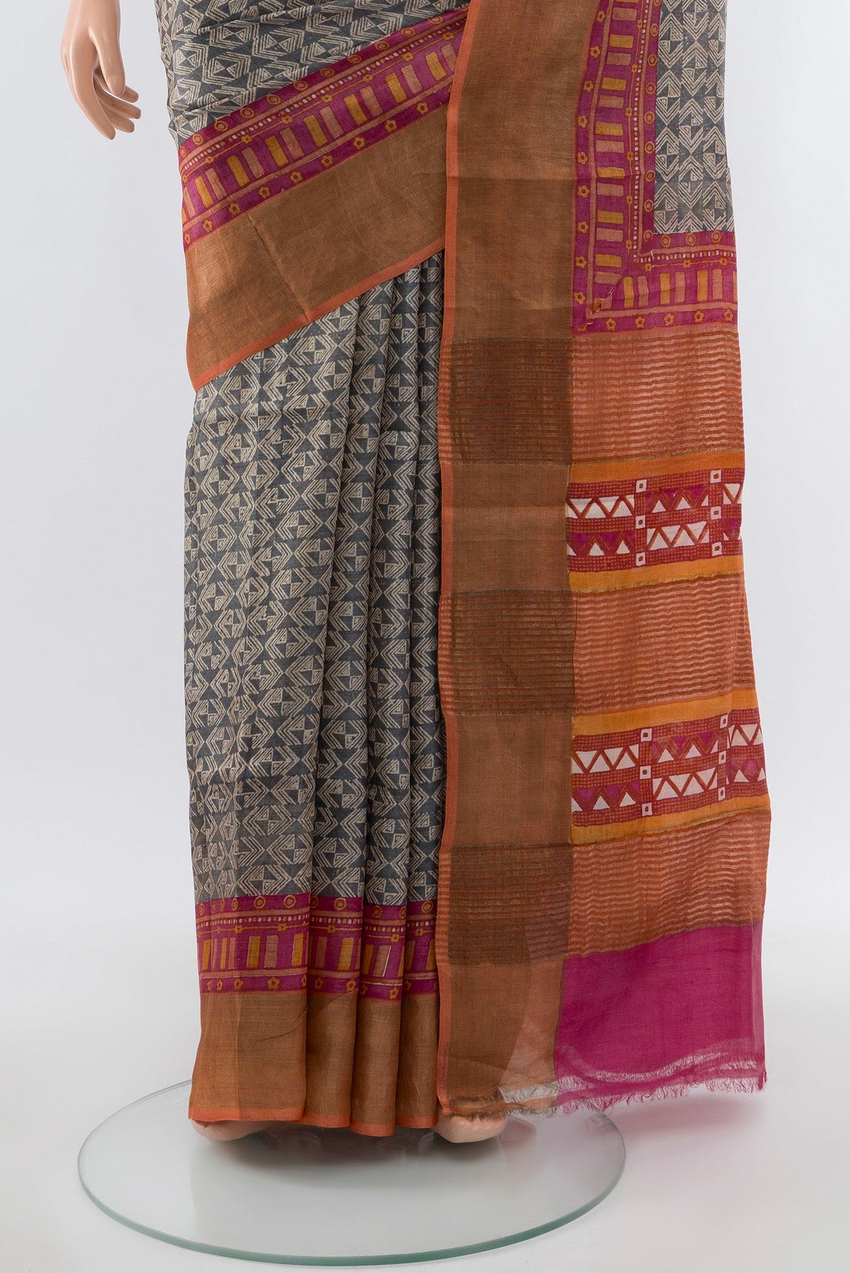 Pleats and pallu of Multi Color Tussar Silk Saree with Floral Print on the body and Silk Border. 