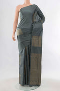 Grey Soft Silk Saree with Zari Butta on the body and Zari Border displayed on a mannequin