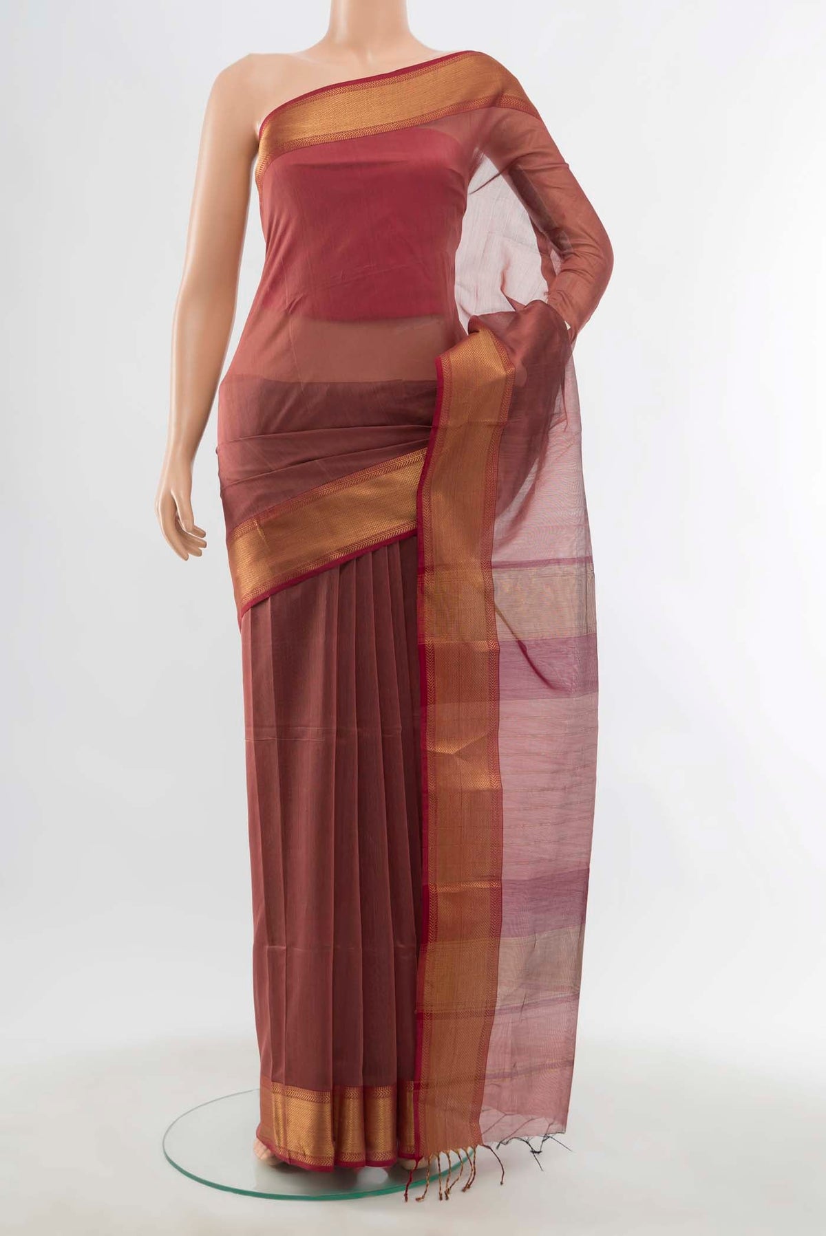 Maroon Maheshwari Silk Cotton Saree with Zari Butta on the body and Silk Border displayed on a mannequin