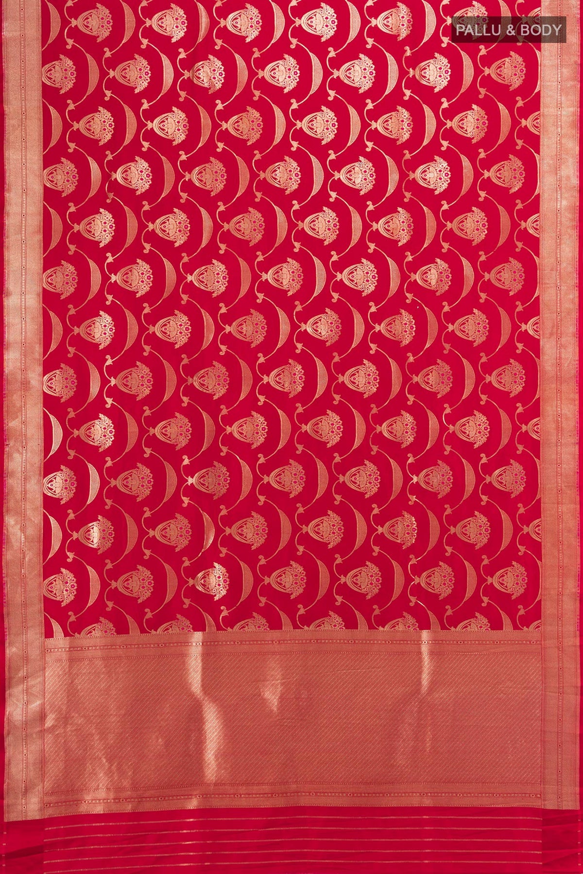 Flat view of Red Banarasi Silk Saree with Zari Butta on the body and Zari Border. 