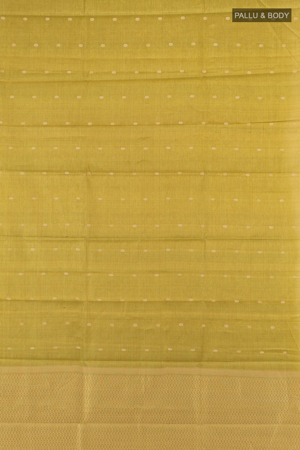 Flat view of Golden Tussar Silk Saree with Zari Butta on the body and Zari Border. 