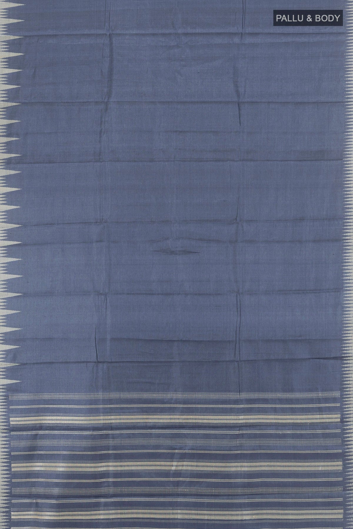 Flat view of Navy Blue Tussar Silk Saree with Plain Body and Temple Border. 