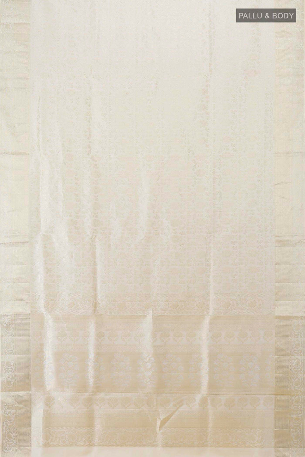 Flat view of Cream Soft Silk Saree with Zari Butta on the body and Silk Border. 
