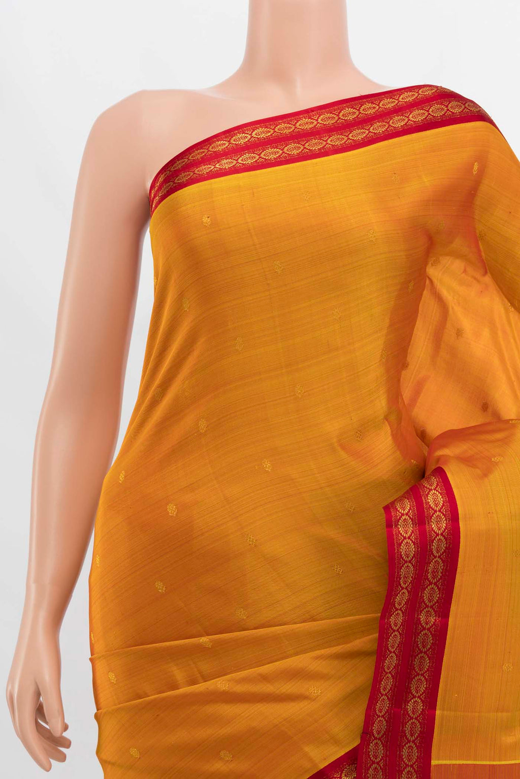 Border image of Mustard Kanchipuram Silk Saree with Zari Butta on the body and Zari Border. 