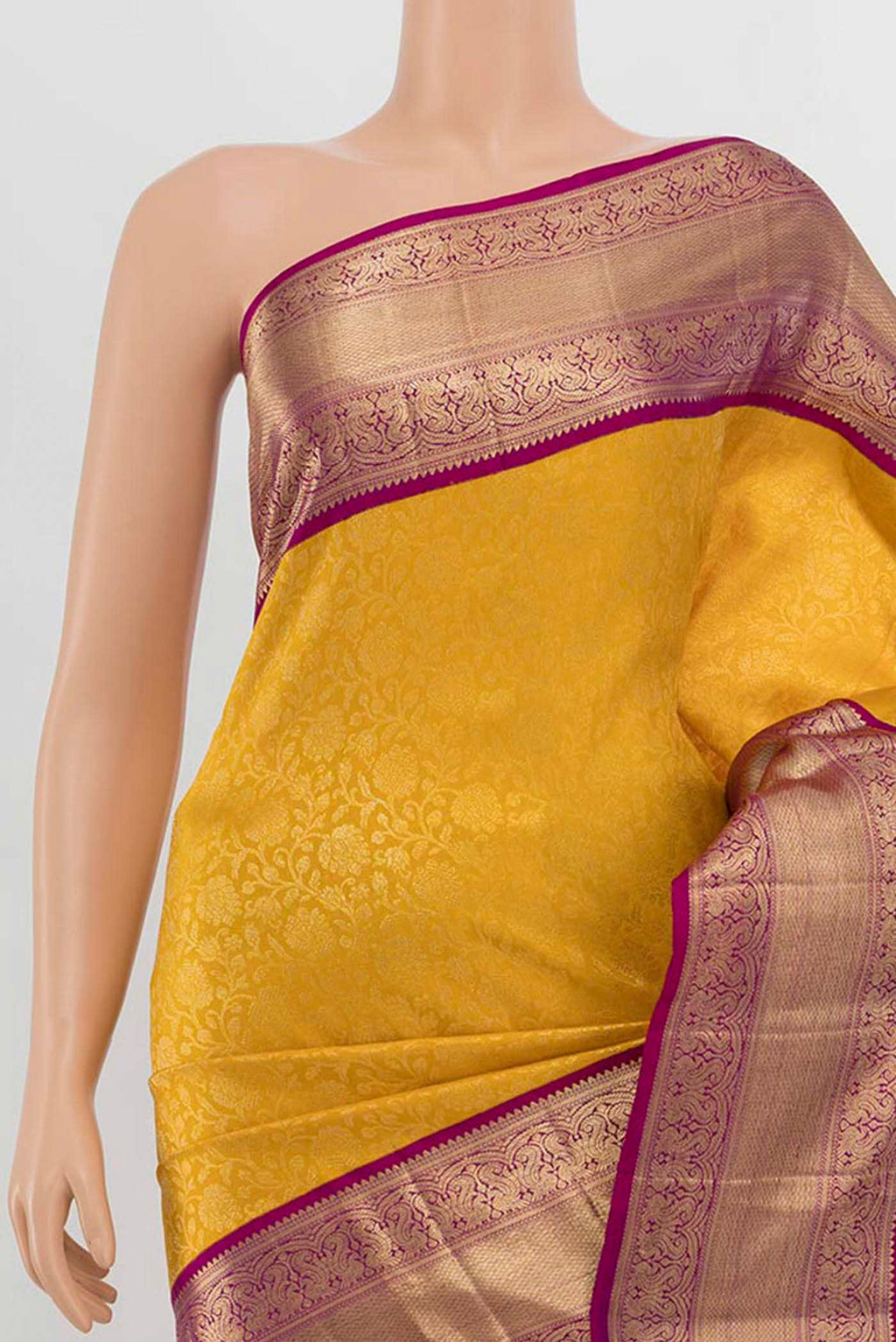 Border image of Yellow Kanchipuram Silk Saree with Zari Butta on the body and Silk Border. 
