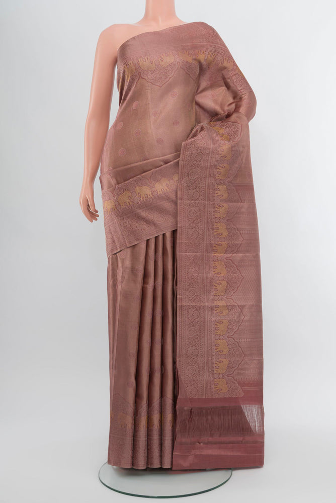 Dark Mauve Kanjivaram Silk Saree with Zari Brocade on the body and Zari Border.  displayed on a mannequin