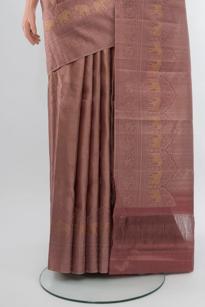 Pleats and pallu of Dark Mauve Kanjivaram Silk Saree with Zari Brocade on the body and Zari Border. 