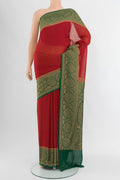 Red Banarasi Georgette Saree with Zari Butta on the body and Zari Border.  displayed on a mannequin