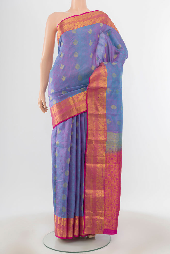 Lavender Kanchipuram Silk Saree with Jacquard With Zari Butta on the body and Zari Border.  displayed on a mannequin