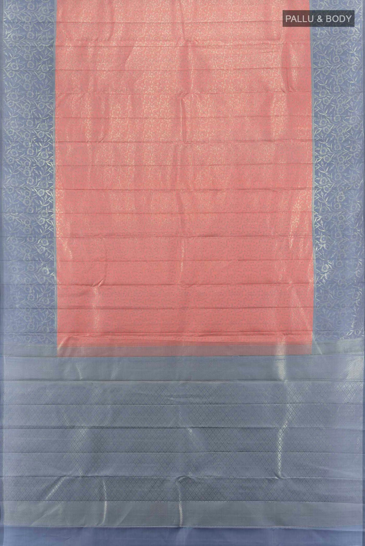 Flat view of Peach Kanchipuram Silk Saree with Zari Butta on the body and Silk Border. 